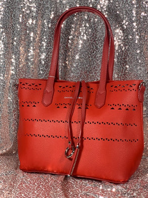 Red laser cut tote style purse